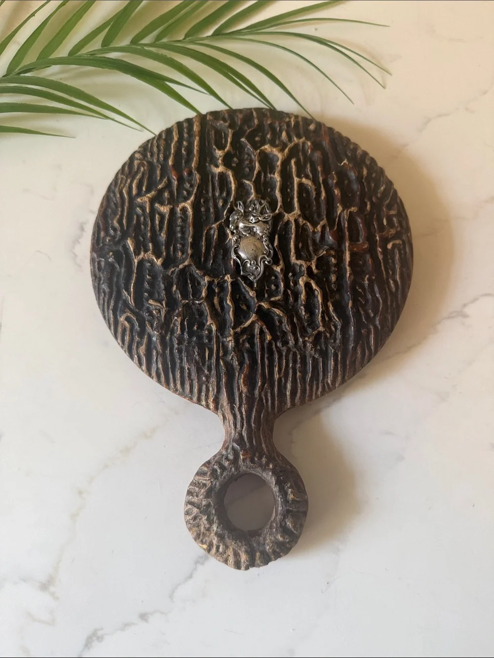 Antique Handheld Beveled Mirror with Faux Bois Handle and Sterling emblem FLAW